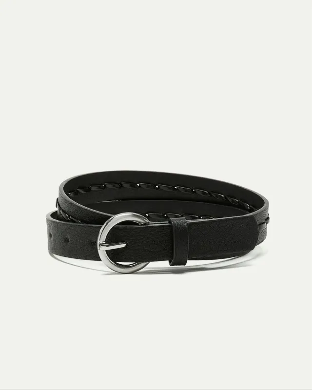 Skinny Faux Leather Belt sold by Reitmans