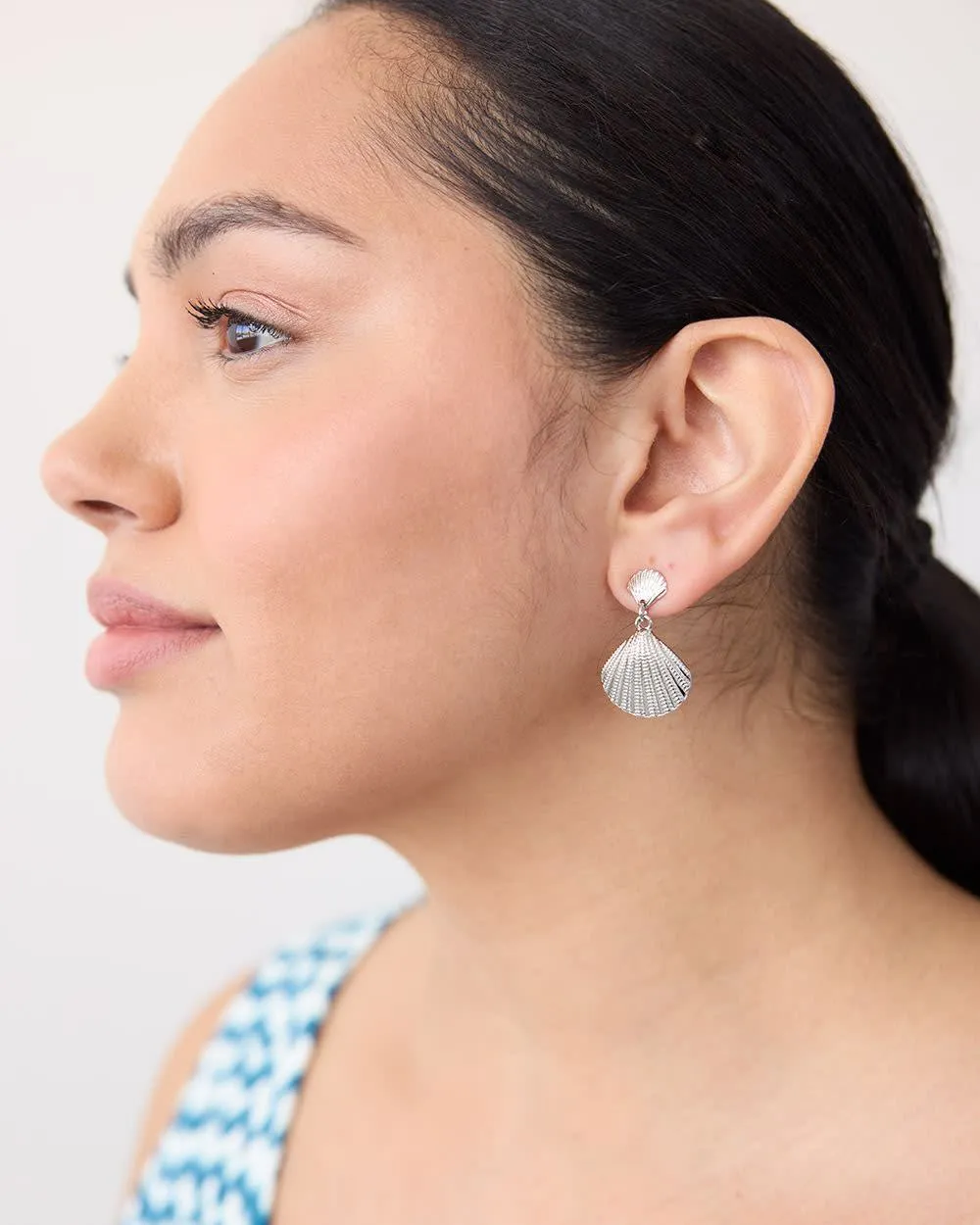 Sea Shell Earrings sold by Reitmans