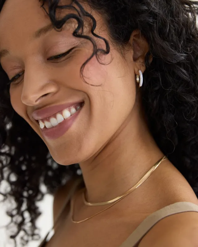 Small Hoops with Enamel sold by Reitmans