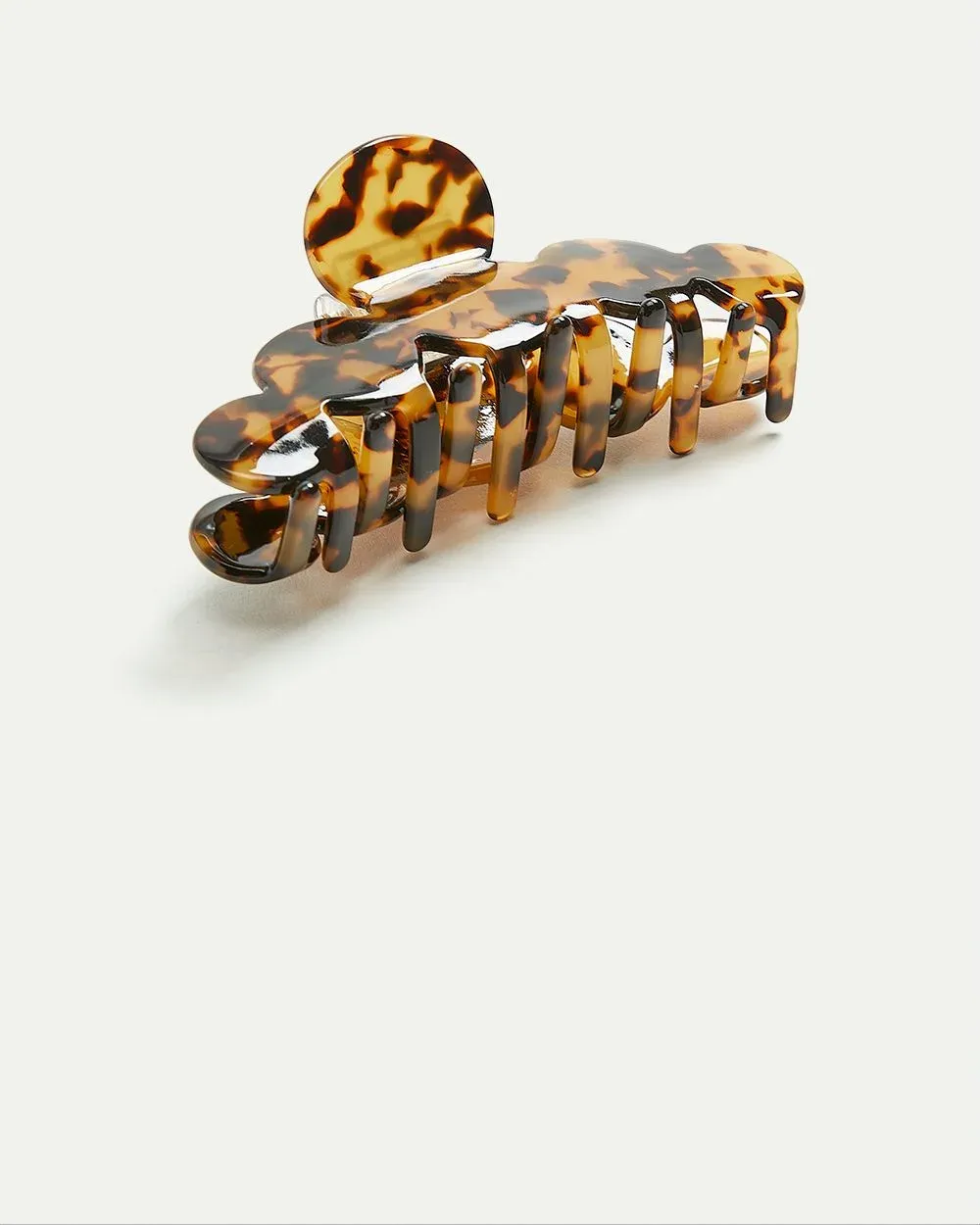 Curved Tortoise Claw Clip sold by Reitmans product image thumbnail 3