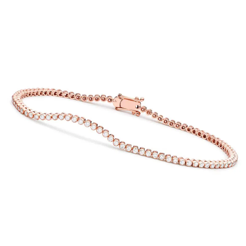 Genevive Sterling Silver with Clear Cubic Zirconia Round Bezel-set Bracelet sold by Reitmans