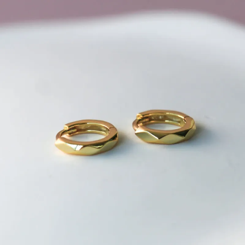 Horace Jewelry -Horace Jewelry - Small hoop earrings with hammered effect Martalo sold by Reitmans