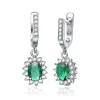 Genevive Sterling Silver White Gold Plated with Colored Cubic Zirconia Flower Shaped Dangling Earrings sold by Reitmans