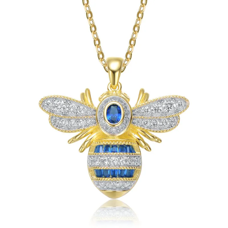 Genevive Sterling Silver 14k Gold Plated with Sapphire Blue Cubic Zirconia Pave Wasp Pendant Necklace sold by Reitmans