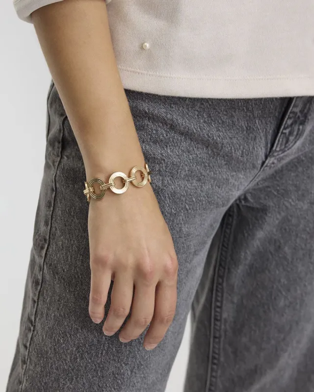 Disk Toggle Bracelet sold by Reitmans