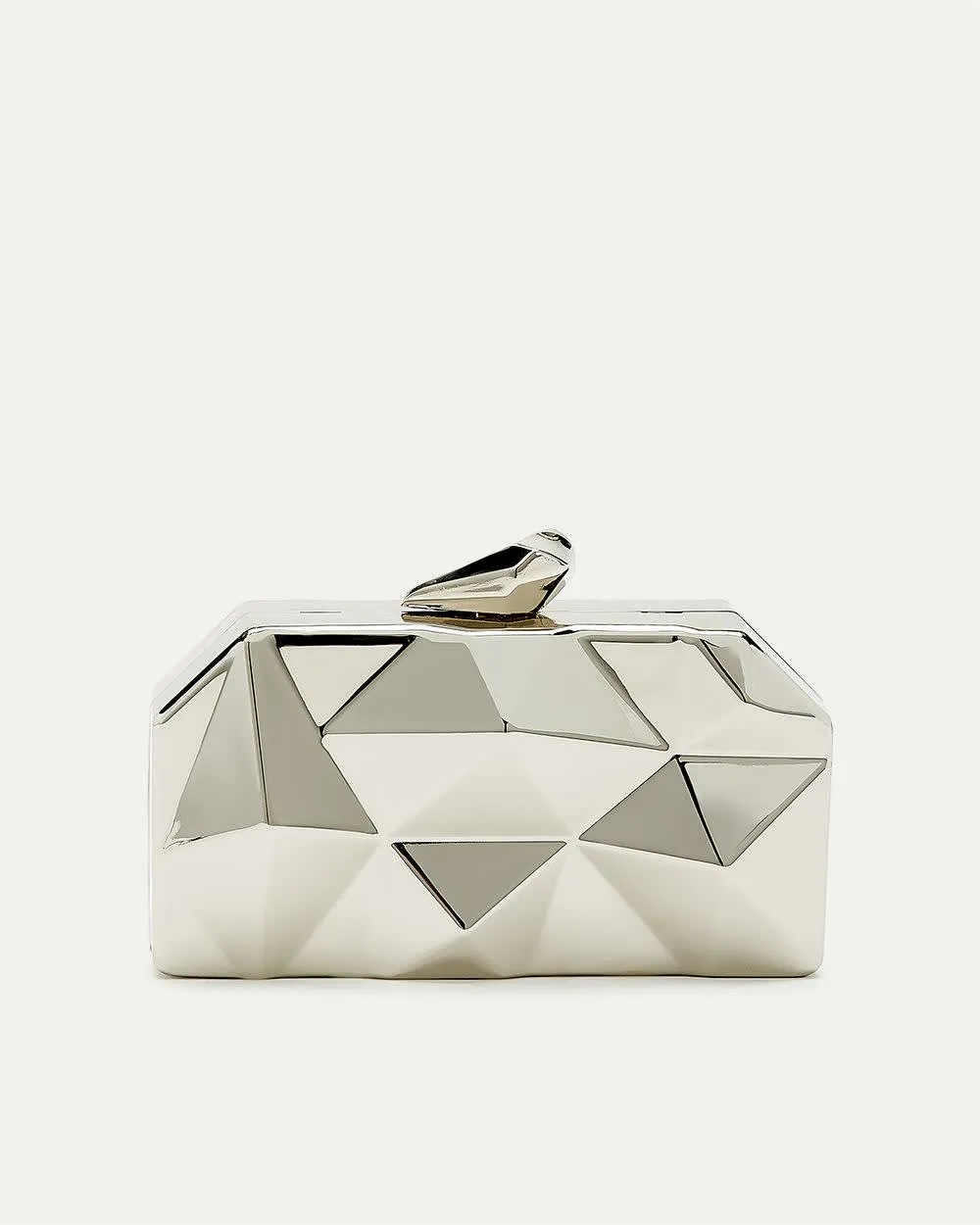 Hard Shell Geo Clutch sold by Reitmans