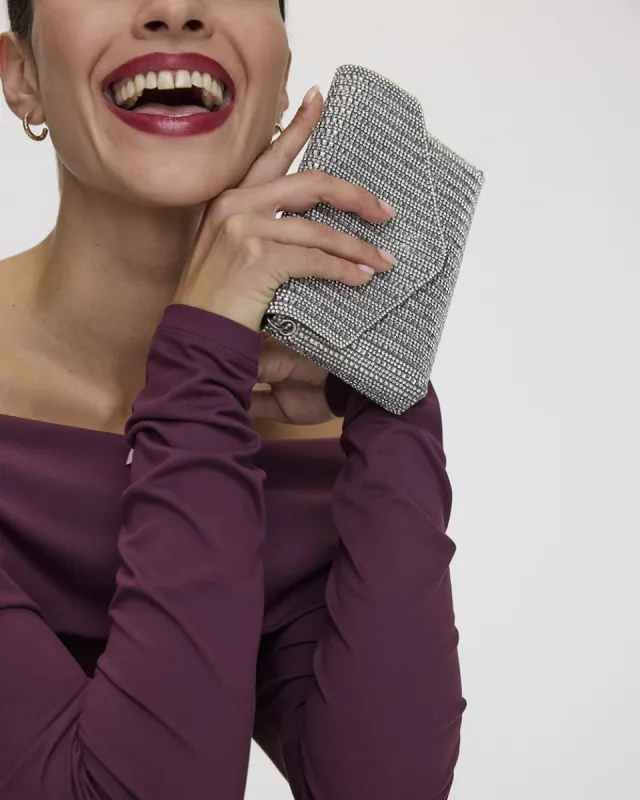 Rectangular Glittery Cross-Body Bag sold by Reitmans