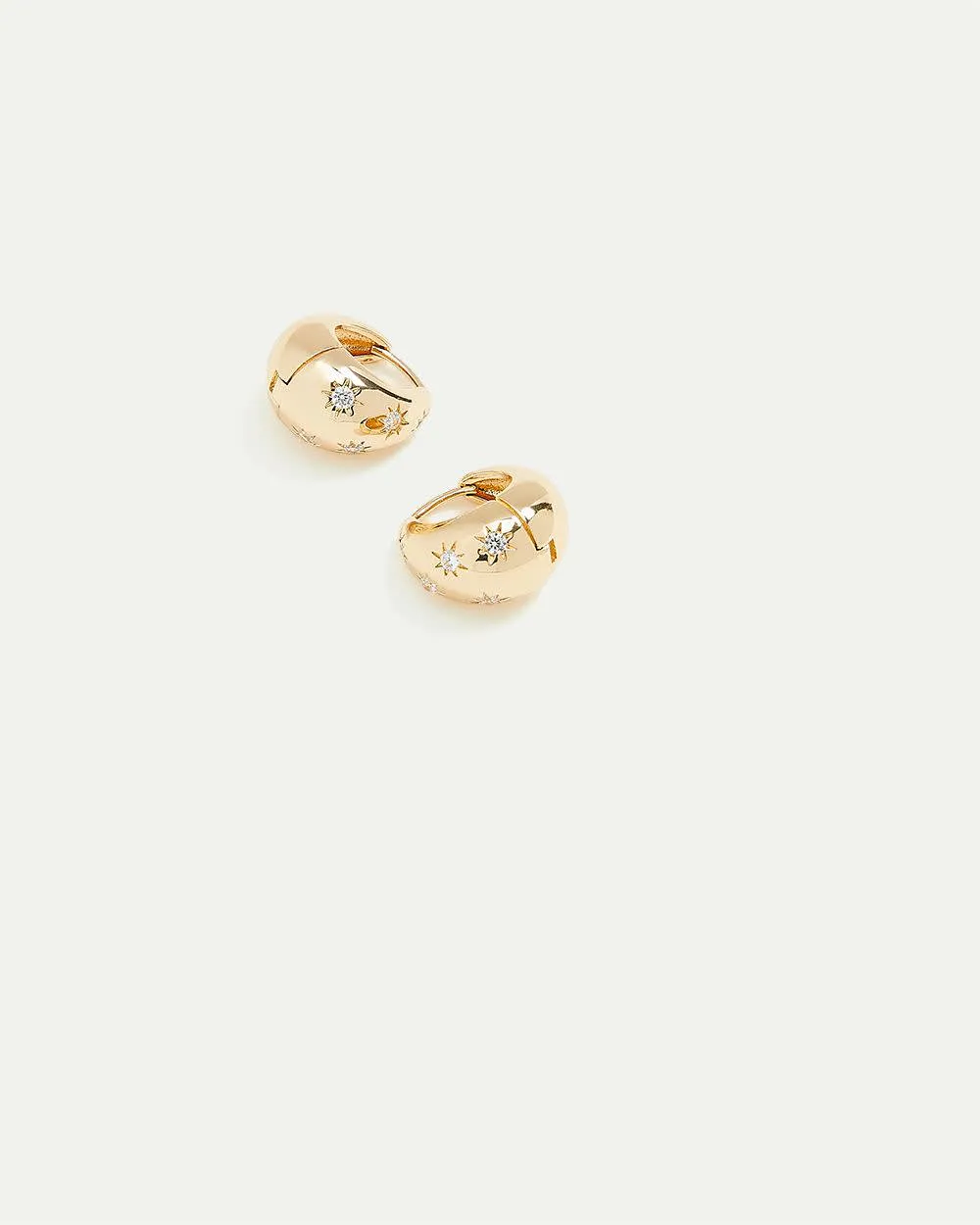 Huggie Earrings with Stars sold by Reitmans