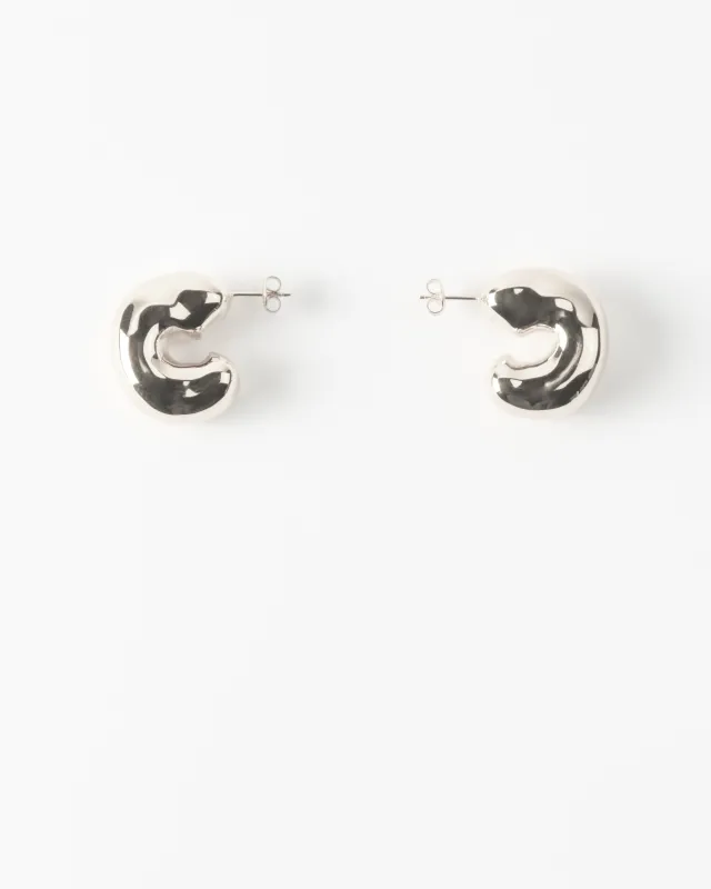 Large Molten Hoops Silver Plated sold by Rejina Pyo