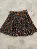 Glow in the Dark Dancing Bones Skater Skirt sold by Retrolicious