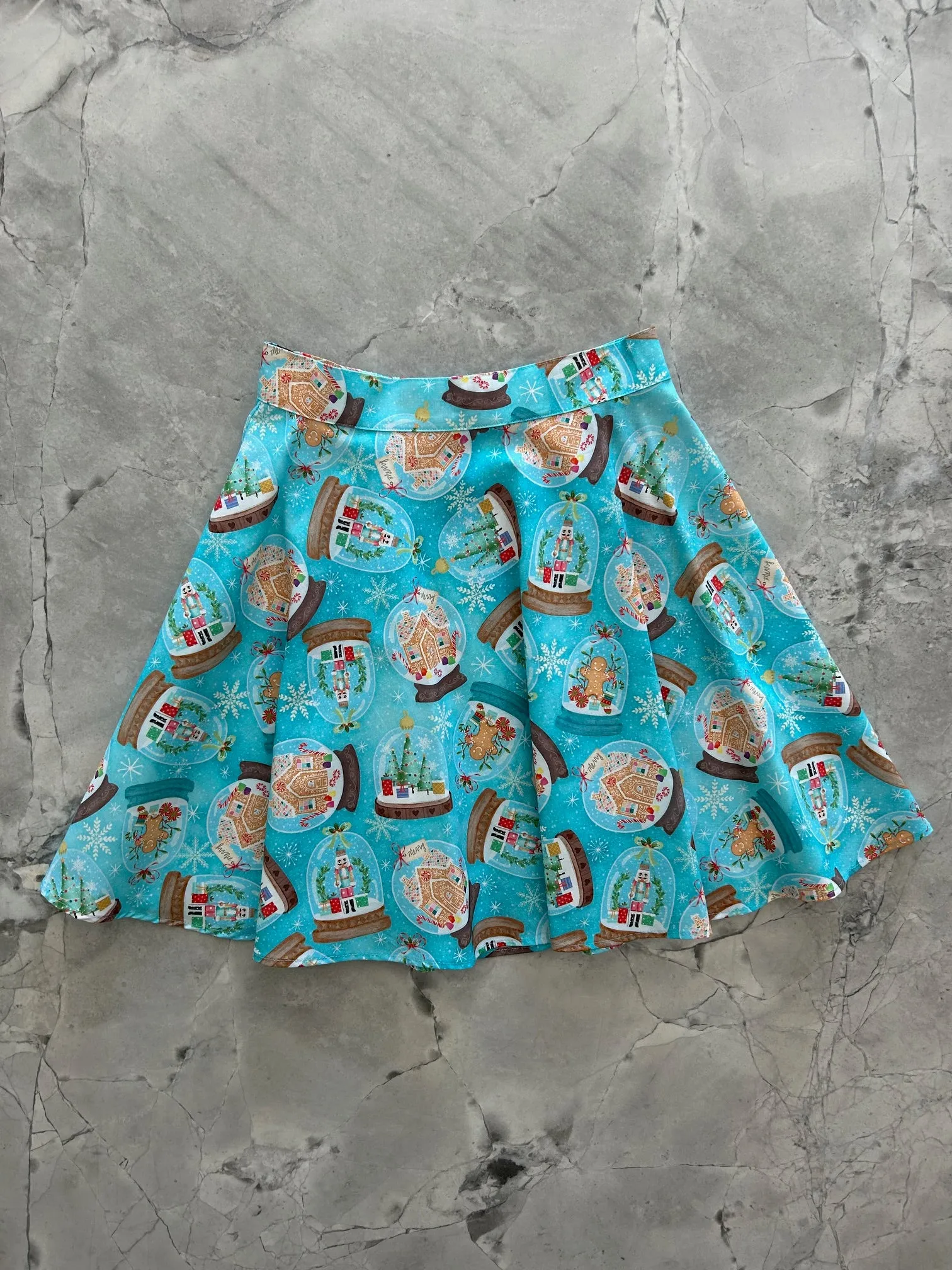 Snow Globes Skater Skirt sold by Retrolicious