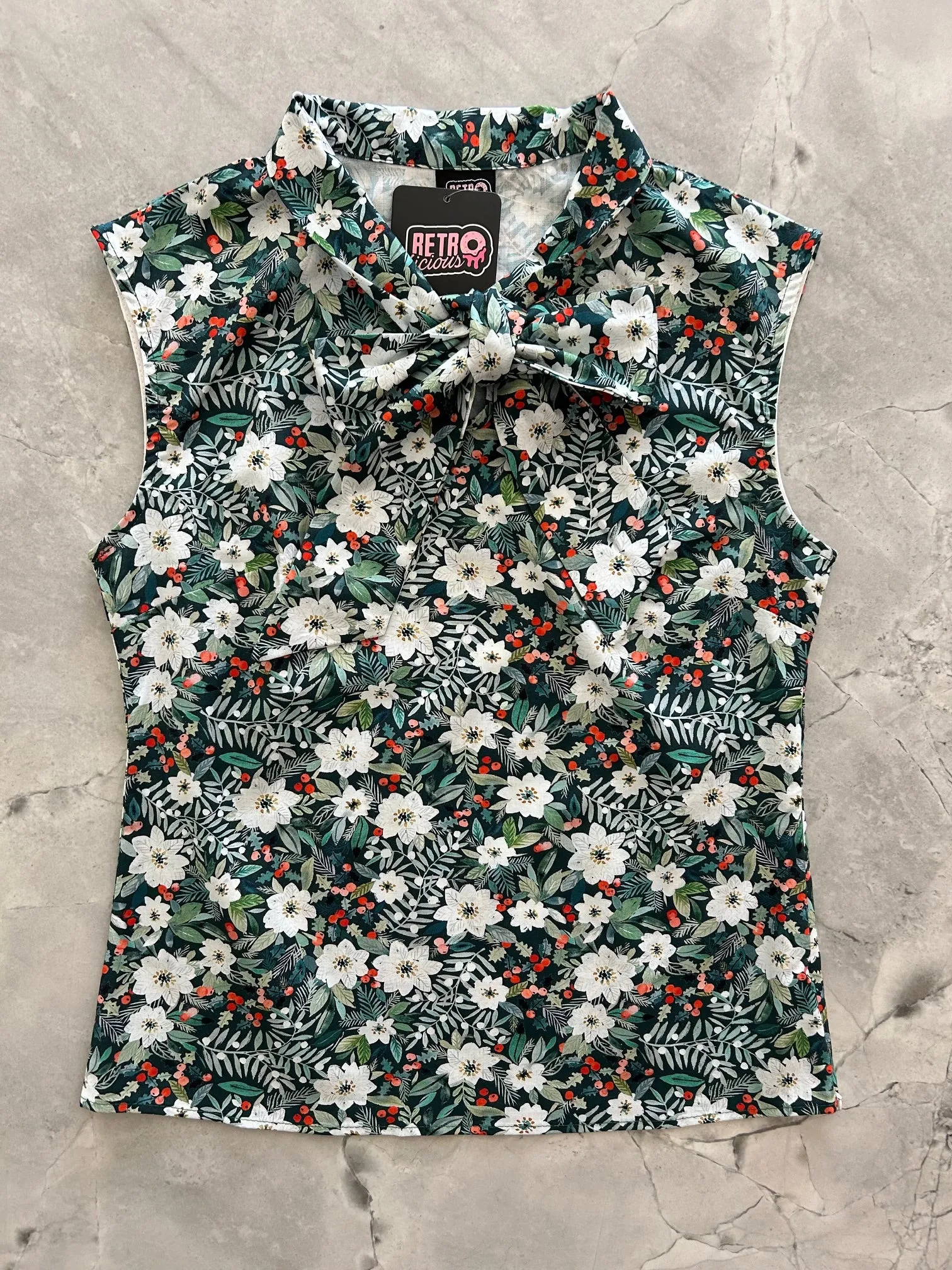 Winter Floral Bow Top sold by Retrolicious