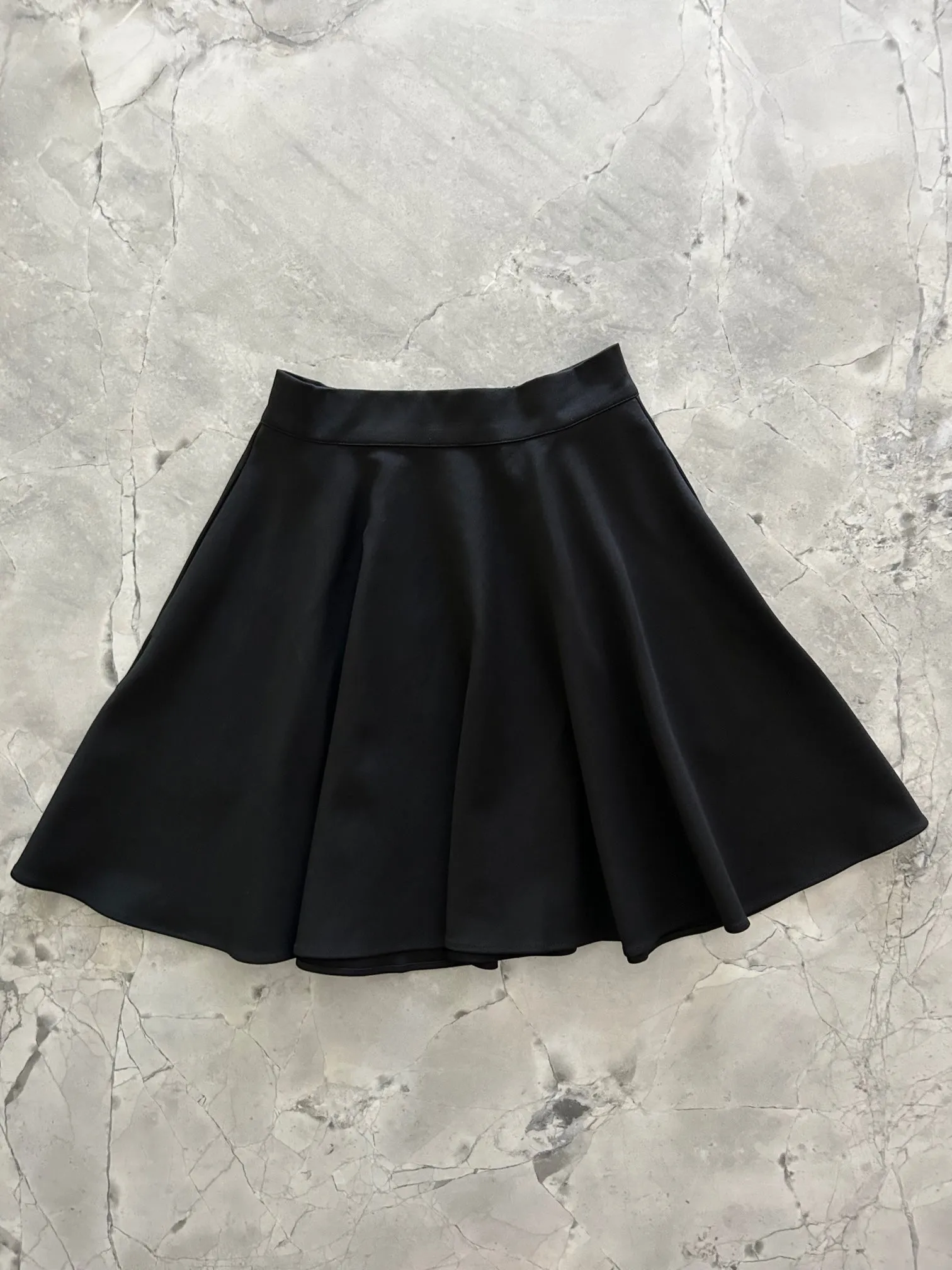 Harper Skater Skirt in Black sold by Retrolicious