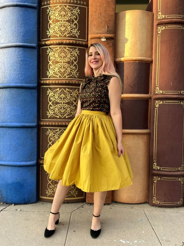 Peggy Swing Skirt in Mustard sold by Retrolicious