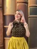 Peggy Swing Skirt in Mustard sold by Retrolicious