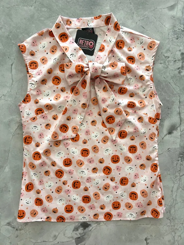 Pink Jack-o’-lantern Bow Top sold by Retrolicious