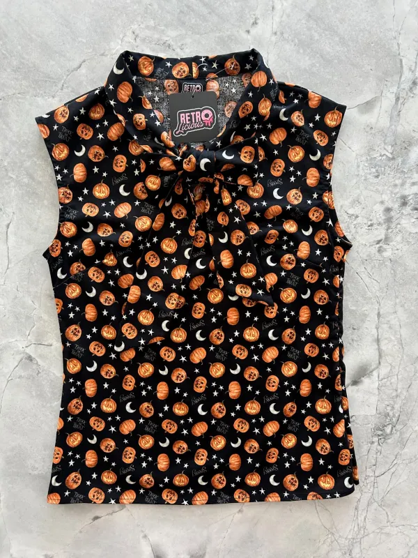 Jack-o’-lantern Bow Top sold by Retrolicious