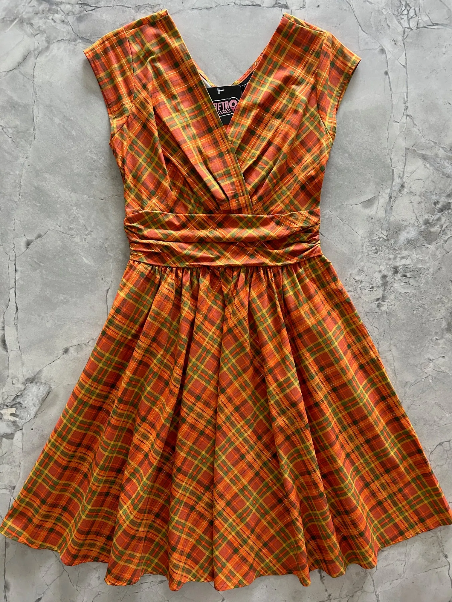 Orange Plaid Greta Dress sold by Retrolicious