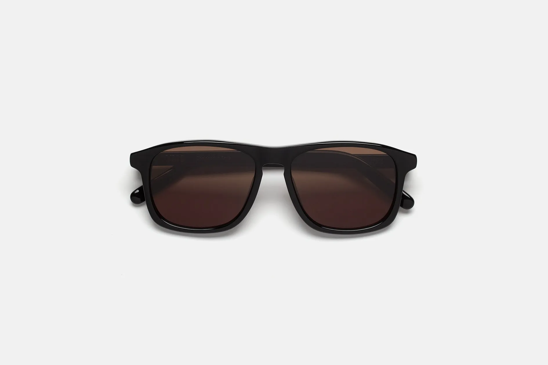 Lunettes 8 Noires et Marron sold by RetroSuperFuture