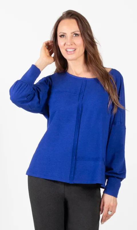 Exposed Stitch Dolman Top sold by Revolution Boutique