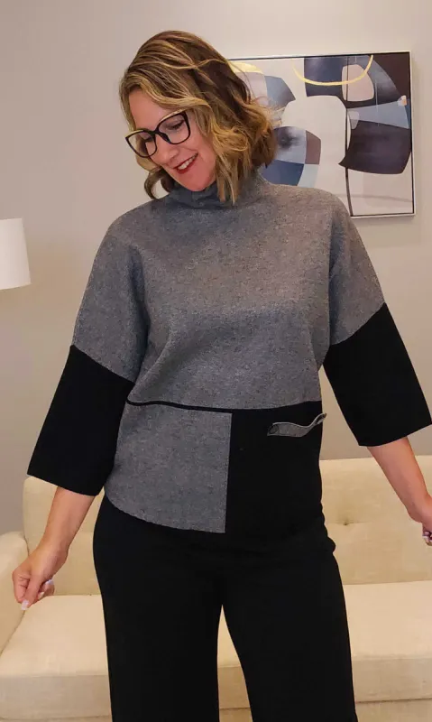 Dolman Funnel Neck Top sold by Revolution Boutique