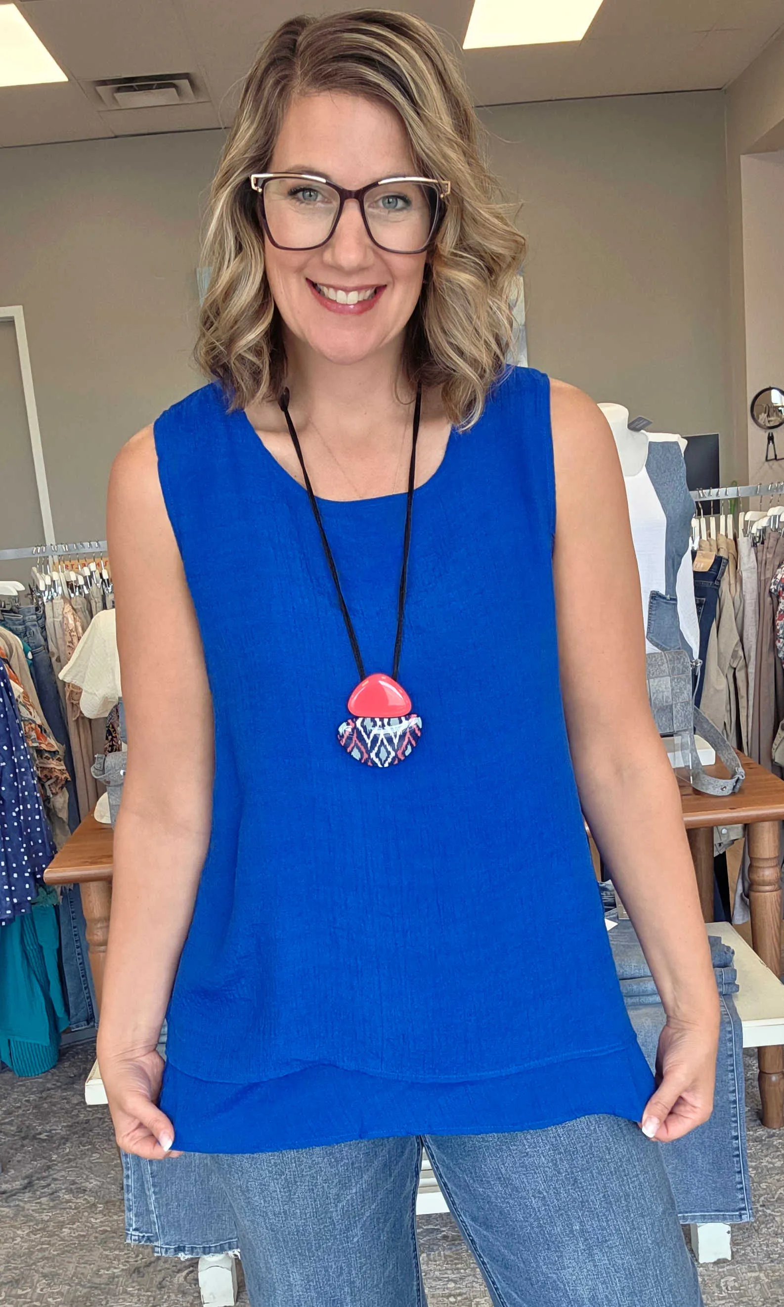 Textured Layered Hem Tunic Top sold by Revolution Boutique