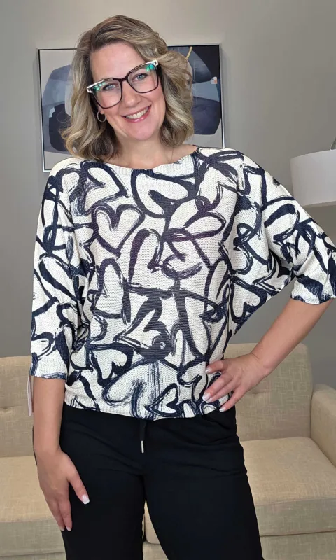 Heart Print Knit Top sold by Revolution Boutique