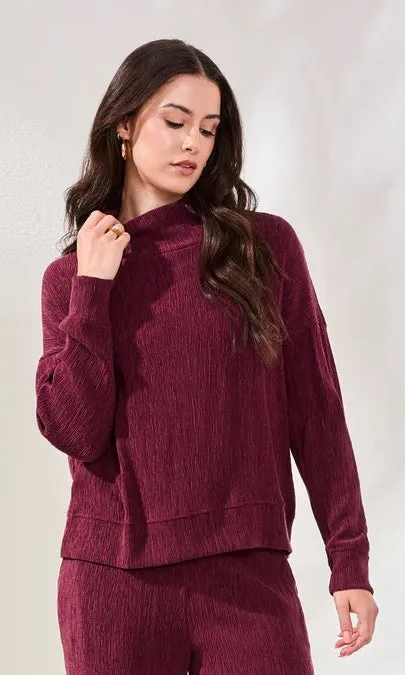Mock Neck Crinkle Knit Top sold by Revolution Boutique