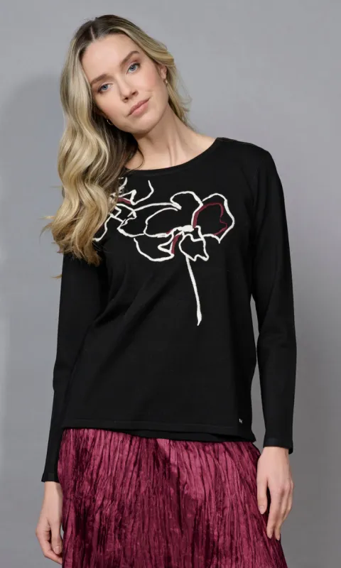 Embroidered Floral Top sold by Revolution Boutique