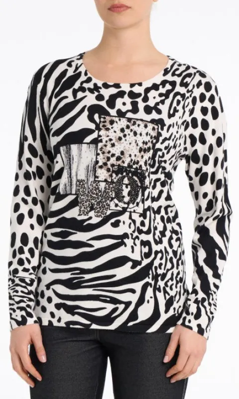 Rhinestone Mixed Animal Print Top sold by Revolution Boutique