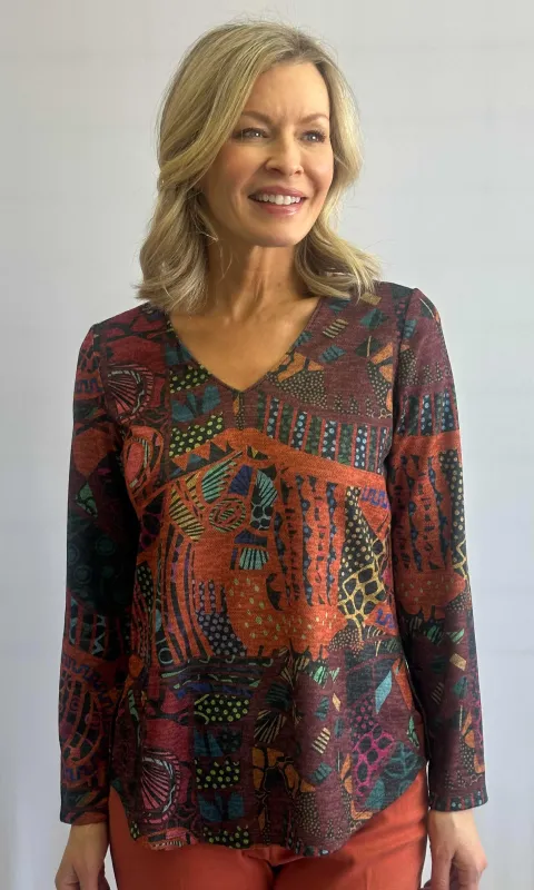 Soft Knit Vibrant Top sold by Revolution Boutique