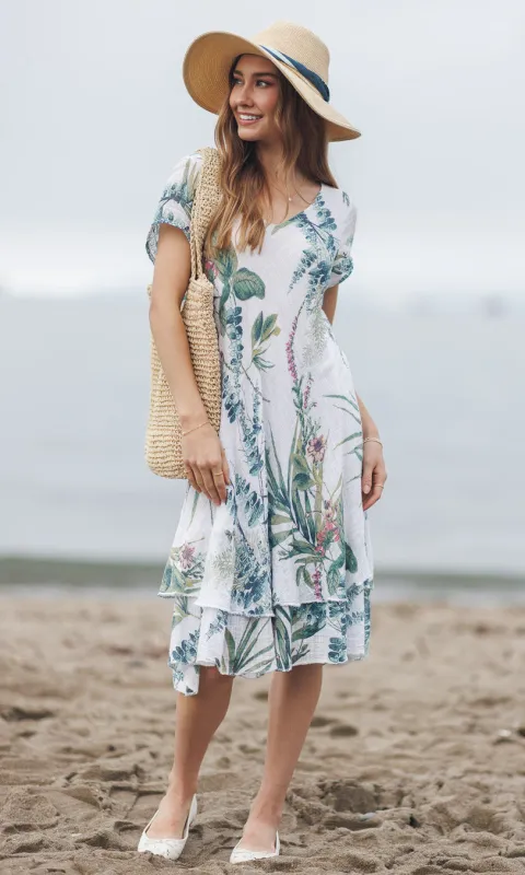 Short Sleeve Botanical Print Tiered Beach Dress sold by Revolution Boutique