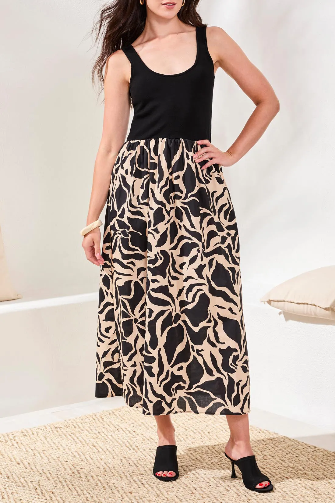 Sleeveless Mixed Media Printed Midi Dress sold by Revolution Boutique