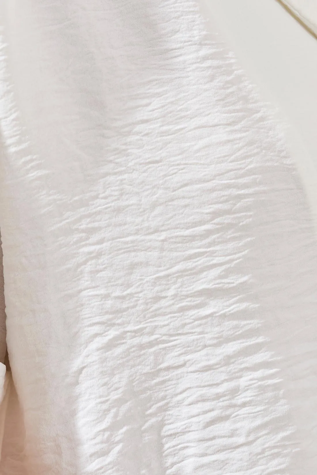 Textured Relaxed Fit Short Sleeve Blouse sold by Revolution Boutique product image thumbnail 3
