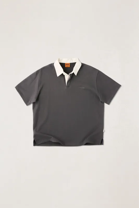 Koa Ss Rugby Polo Charcoal sold by Rhythm.