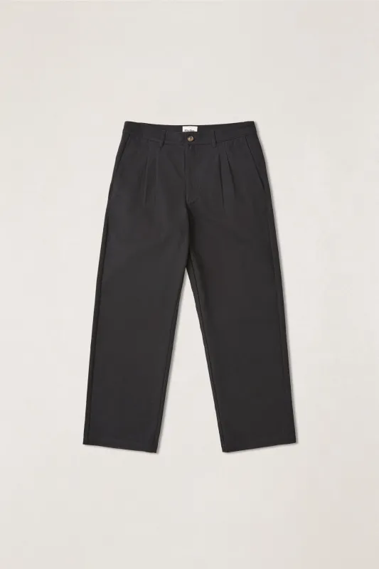 Essential Pleated Twill Trouser Black sold by Rhythm.