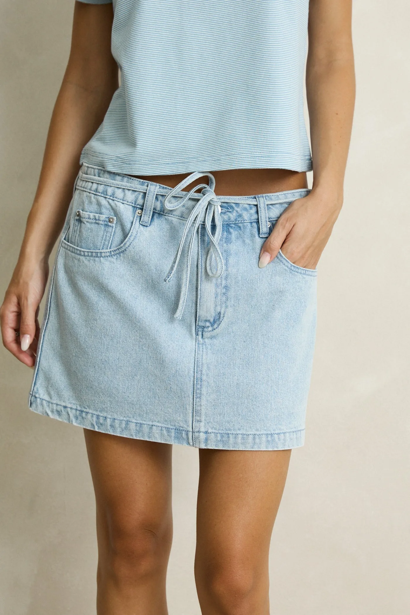 Charlie Low Rise Mini Skirt
Light Wash sold by Rhythm. product image thumbnail 2