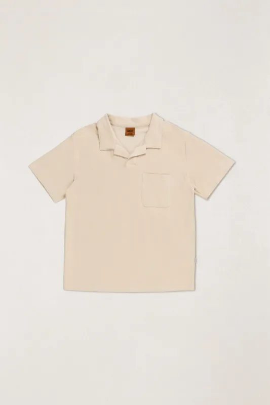 Vintage Terry Polo Sand made by Rhythm.