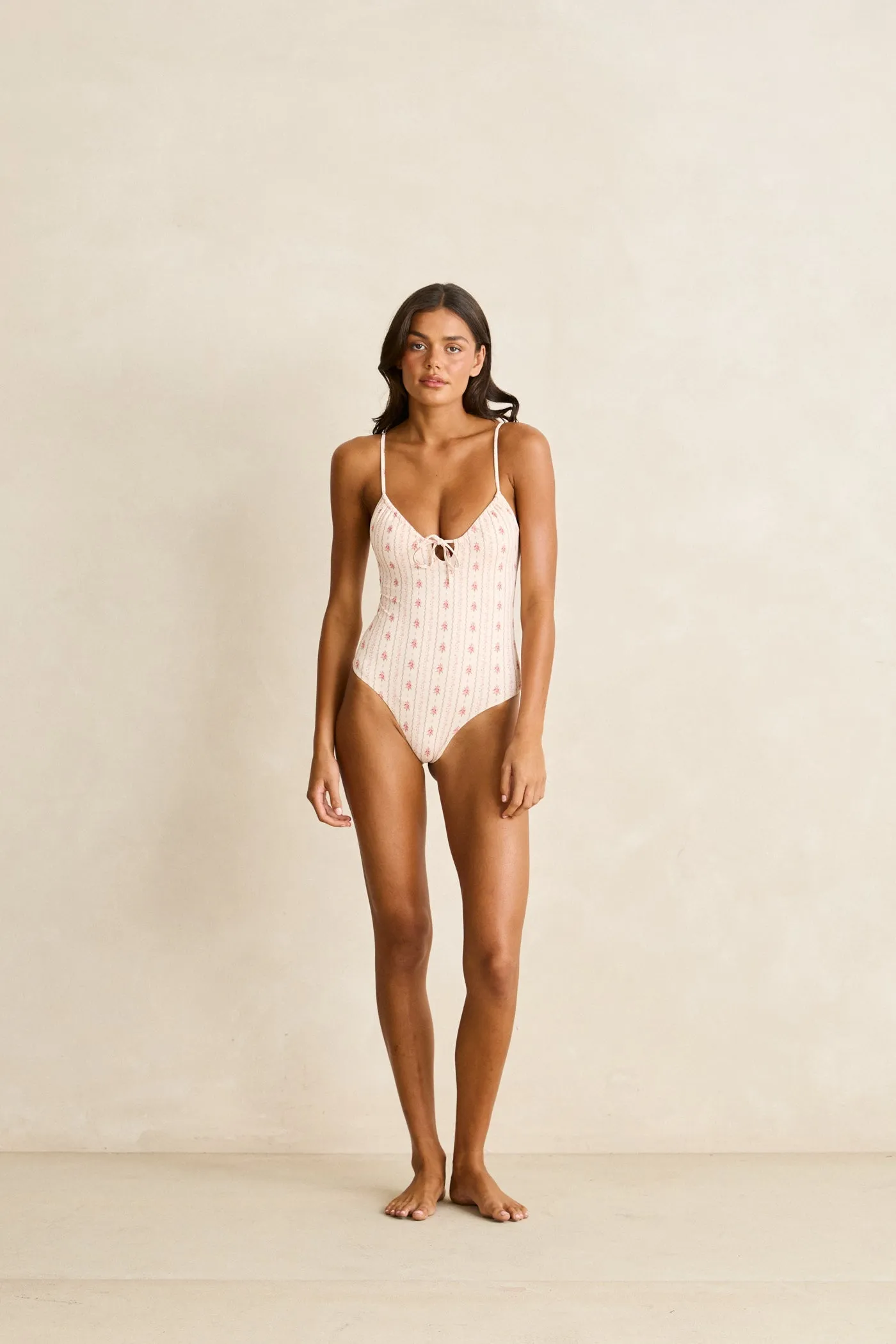 Vintage Floral Tie Front One Piece Rose sold by Rhythm.
