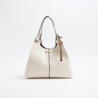 Cream Faux Leather Tote Bag sold by River Island