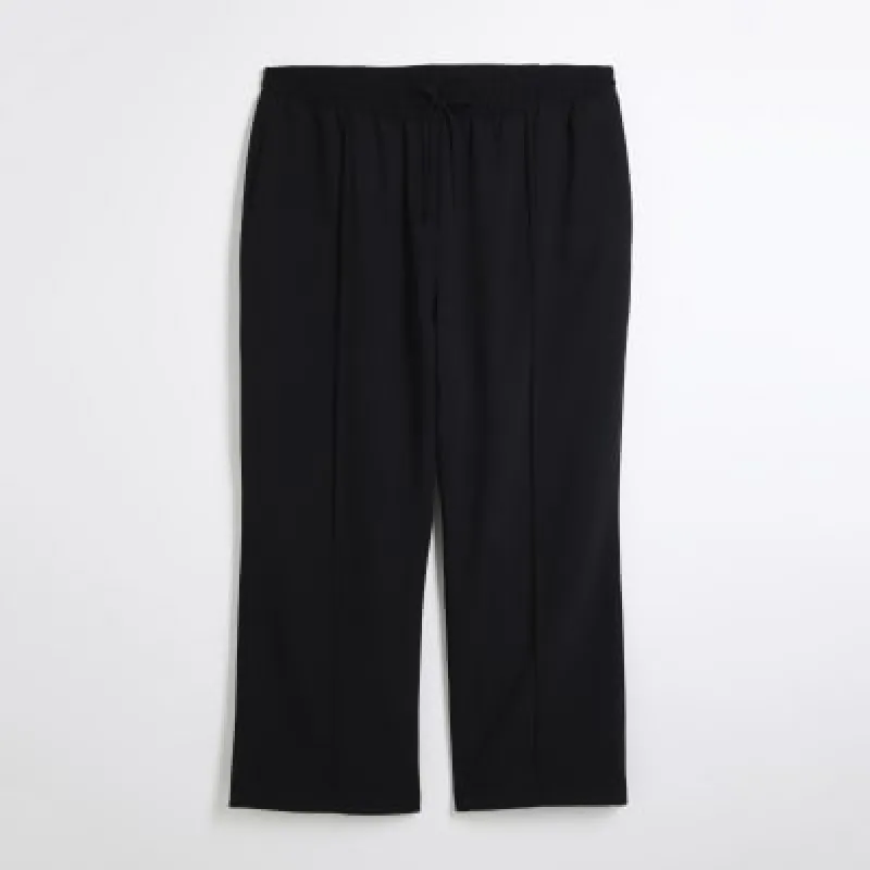 Plus Black tailored joggers sold by River Island