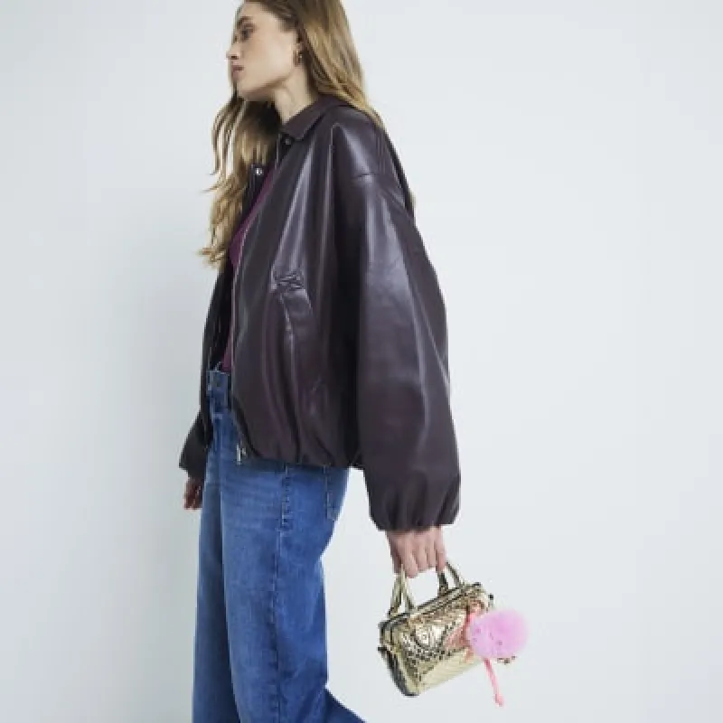 Gold Mini Embossed Monogram Cross Body Bag sold by River Island