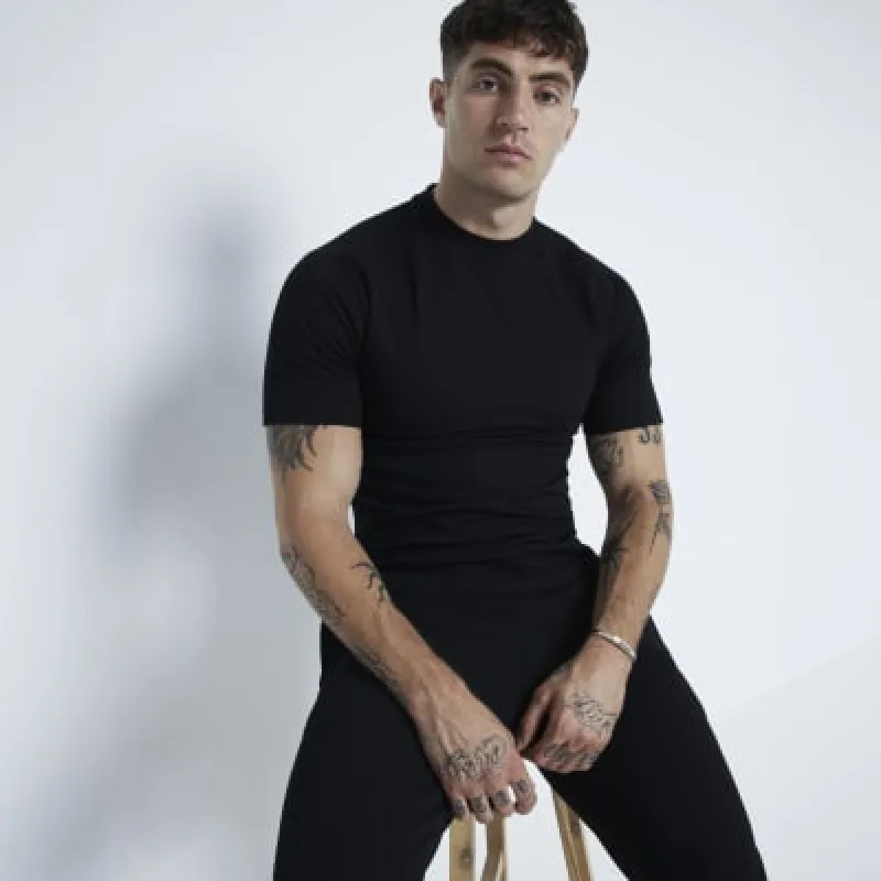 Black Muscle Fit Pique T-Shirt sold by River Island