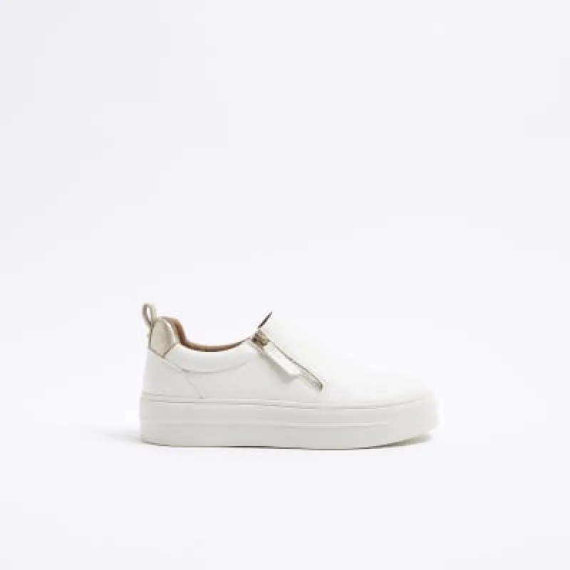 White zip platform trainers sold by River Island