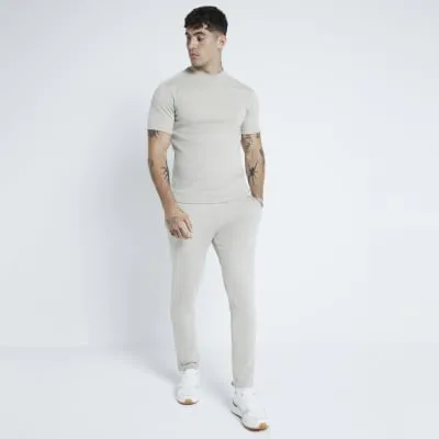 Stone Pique Skinny Fit Joggers sold by River Island