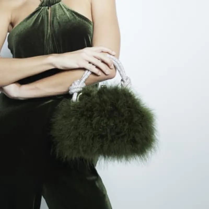 Green Feather Frame Clutch Bag sold by River Island