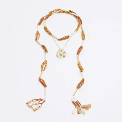 Orange Beaded Layered Necklace sold by River Island