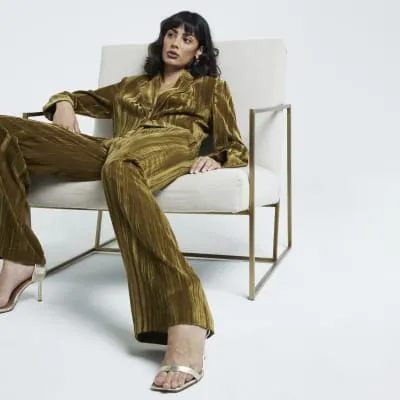 Green Velvet Wide Leg Trousers sold by River Island