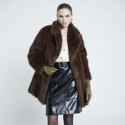 Dark brown mid length faux fur coat sold by River Island