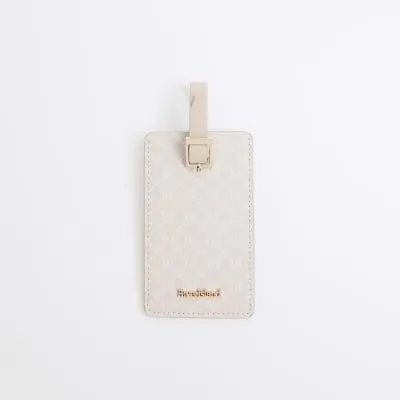 Beige Faux Leather Monogram Luggage Tag sold by River Island